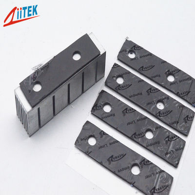 Matériaux d'absorption de chaleur conducteurs doux gris foncé 1,5 W/MK pour électronique industrielle