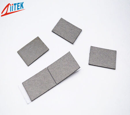 Matériau absorbant conducteur thermique à conductivité thermique à perte magnétique élevée de 1,5 W/m・K utilisé dans l'électronique automobile et les solutions de blindage EMI