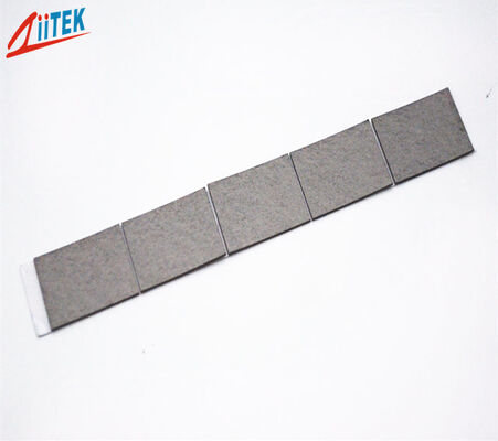 Matériau absorbant conducteur thermique à conductivité thermique à perte magnétique élevée de 1,5 W/m・K utilisé dans l'électronique automobile et les solutions de blindage EMI