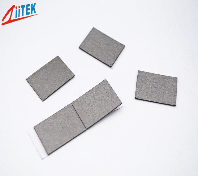 Matériau absorbant conducteur thermique à conductivité thermique à perte magnétique élevée de 1,5 W/m・K utilisé dans l'électronique automobile et les solutions de blindage EMI